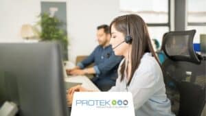 Two employees providing human-assisted services to an AI IT helpdesk.